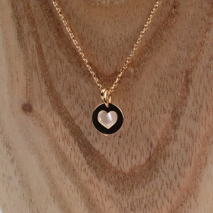 Collier perle d'eau douce et coeur ajouré