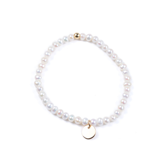 Bracelet en perles d’eau douce et médaille plaqué or